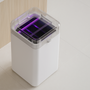 Royal Bin™ Signature 17L with purple LED sensor in a sleek apartment setting — perfect for modern minimalist living.